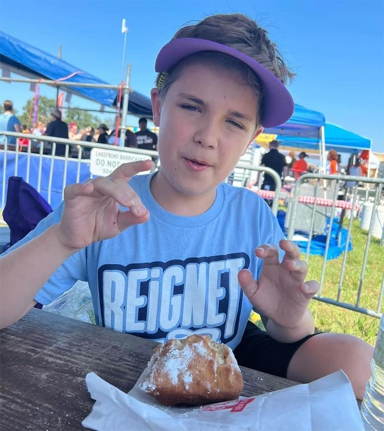 Liam eating a beignet Liam eating a beignet